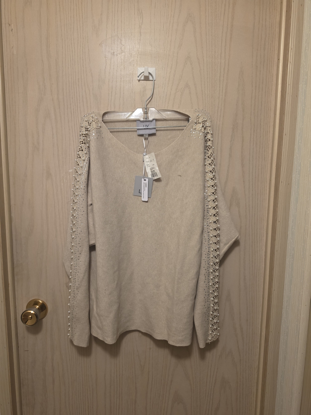 Embellished Sleeve V-Neck Sweater in Cream by LIV